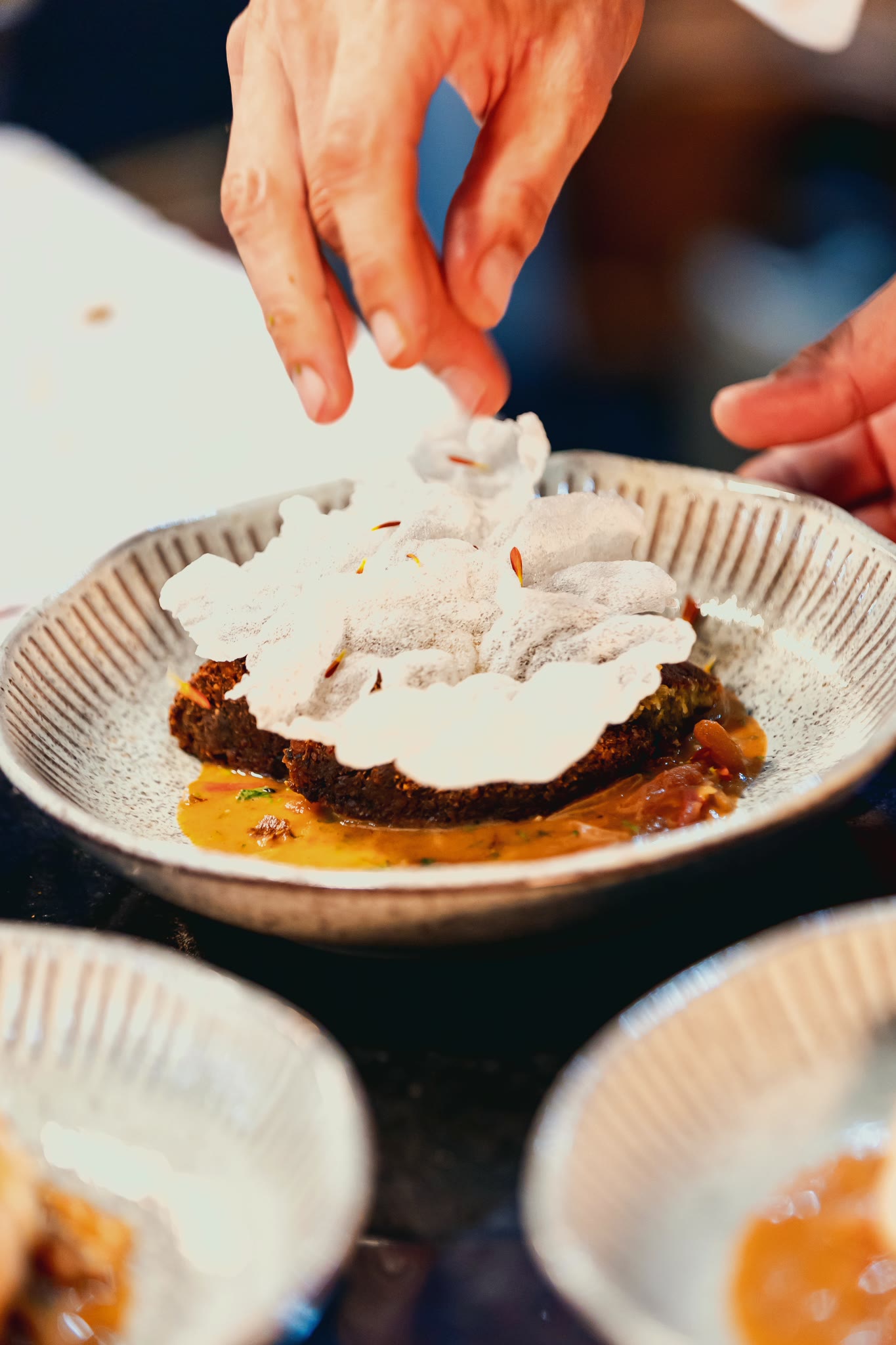 A dish being finished, slice by slice