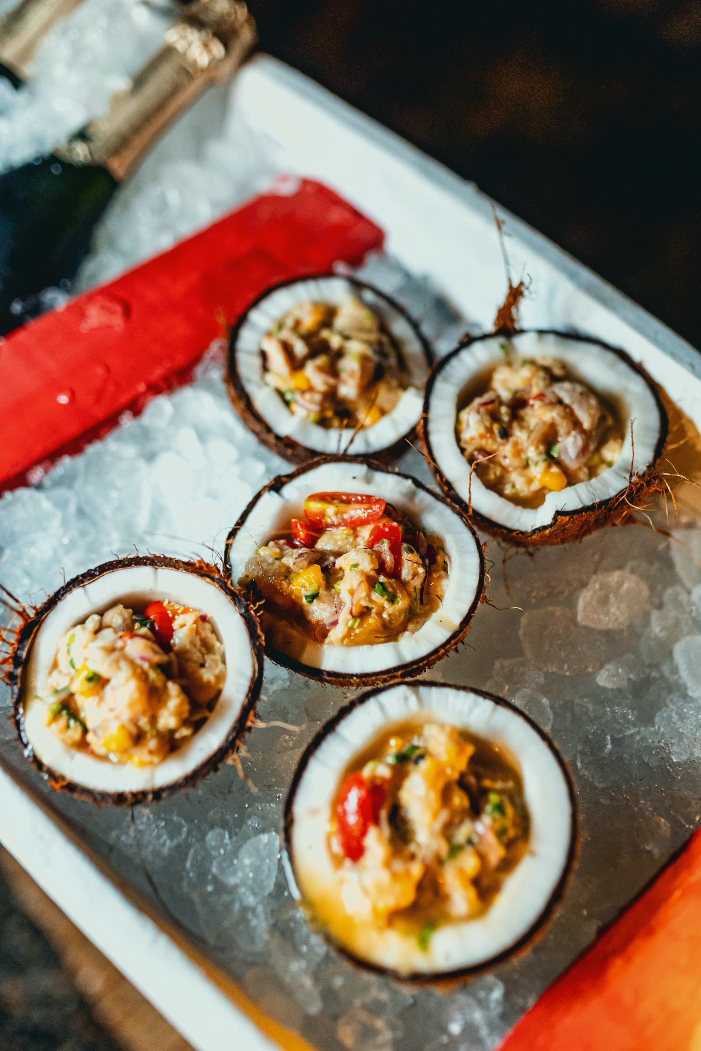 Stuffed coconuts served on ice