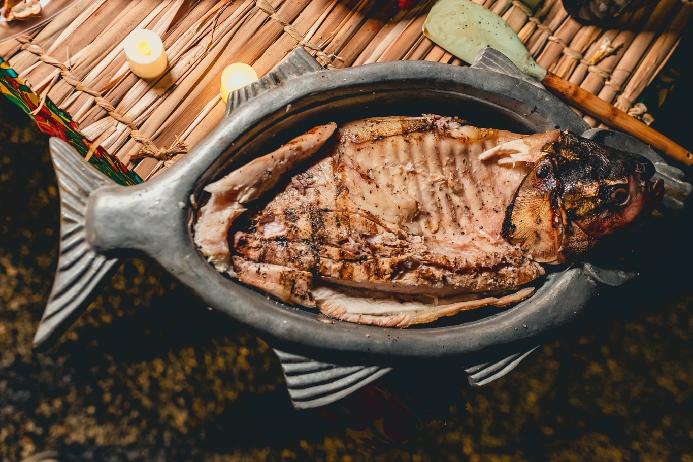 Whole roasted fish, served on a fish-shaped platter